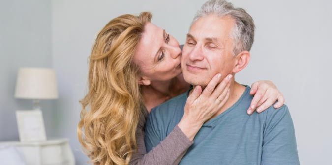 Mature couple enjoying sunset